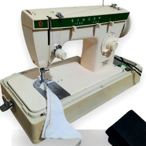 Singer sewing machine made in Brazil 220V like new with case and accessories