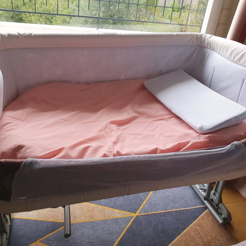 Next to me Zibos baby cot like new with wheels and carrying bag
