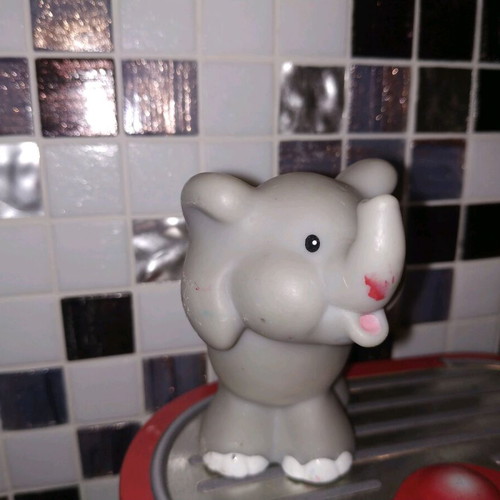 Little People Fisher Price used, 2001, with scratches on ear