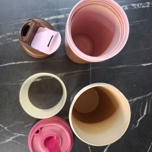 Tupperware and Bamboocup coffee cups used, broken lid on Bamboo cup