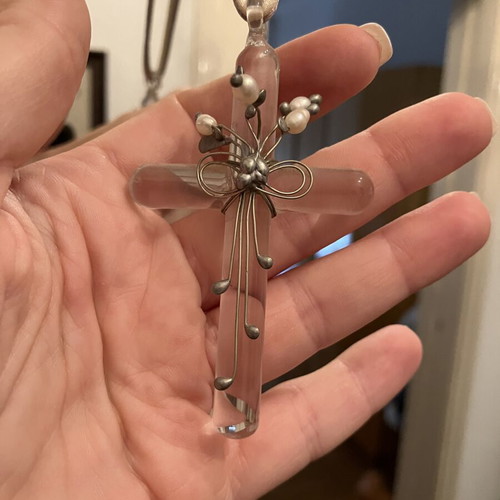 Decorative cross used with silver and pearls