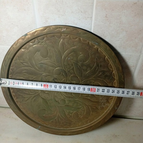 Brass carved tray like new with embossed patterns