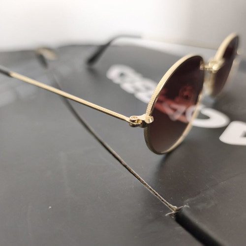 Ray Ban oval sunglasses like new, gold frame, gradient brown lenses
