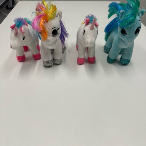 My Little Pony plush toys like new, set of 4 colorful ponies