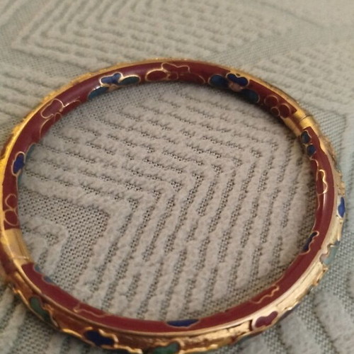 Metal bracelet with unique colorful designs like new