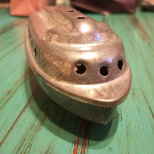 Tin pat pat boat collectible from the 60s