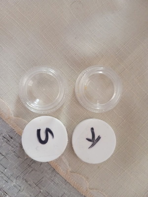 Small cream containers used, set of two