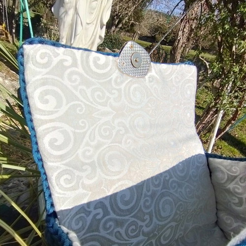 Handmade knitted shoulder bag blue, lined with gold details