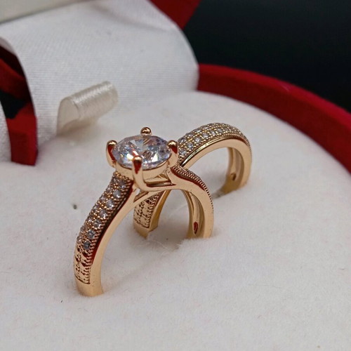 Set of solitaire ring and wedding band plated new with zircon