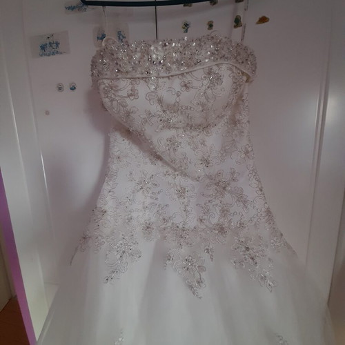 Wedding dress ivory used, strapless with thin extra straps, size small
