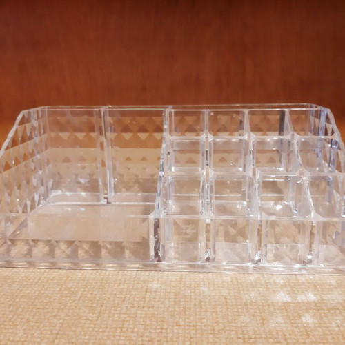 Cosmetic organizer used, transparent