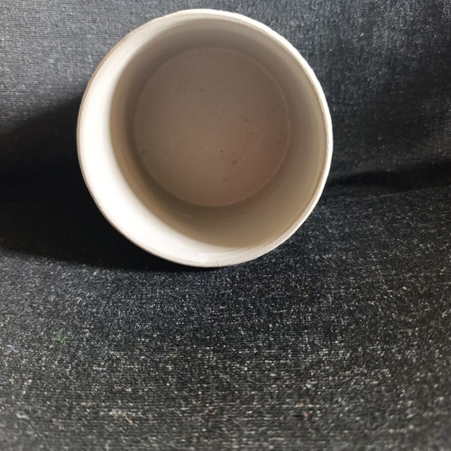 Ceramic planter like new with modern embossed geometric design