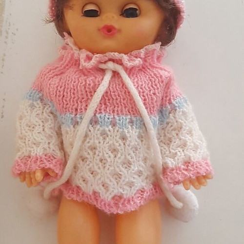 Vintage plastic baby doll from the 70s used with handmade sweater and hat