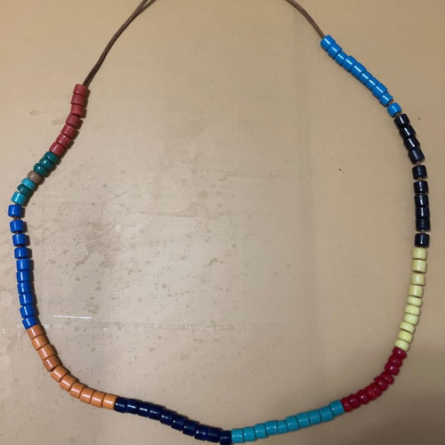 Necklace used with colorful beads and leather strap