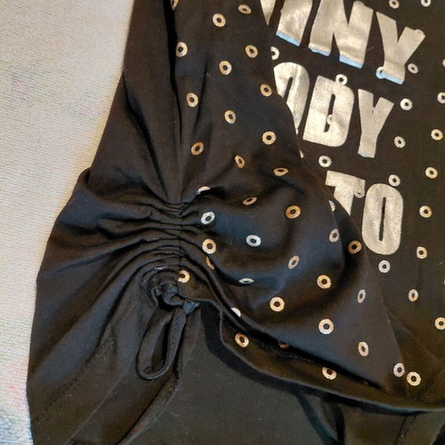 Shiny top black with gold details, like new, size S