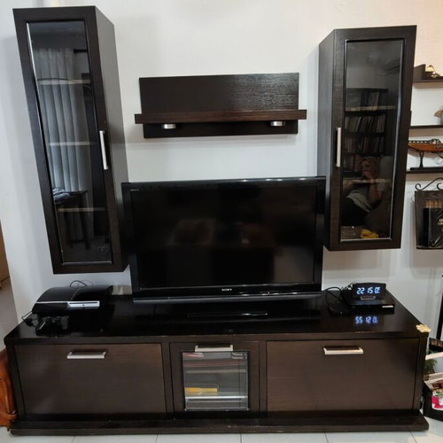Living room unit used with lower cabinet, wall columns, and shelves