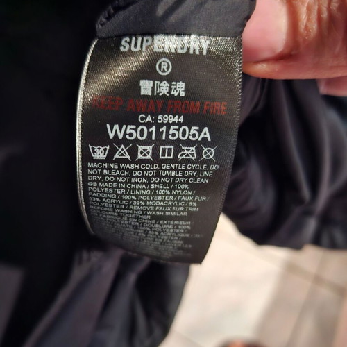 Superdry Everest black jacket like new with faux fur hood