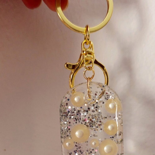 Handmade keychain new resin with pearls and silver detail