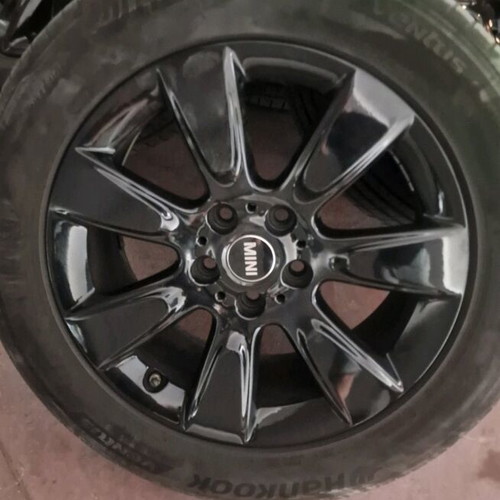 Mini 225 55 17 tires and rims like new, genuine black wheels
