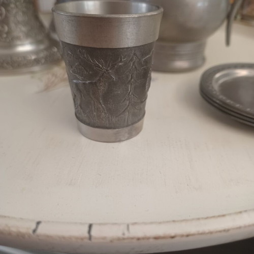 Pewter shot glass used with beautiful designs