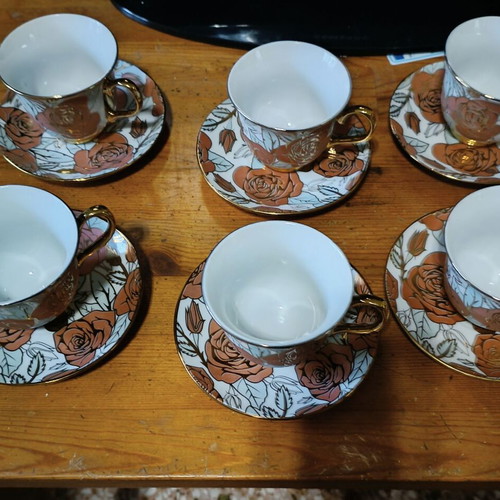 Tea and coffee set new with gold trim and rose design