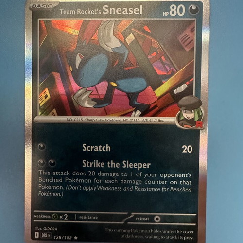 Team Rocket's Sneasel Pokemon Card new