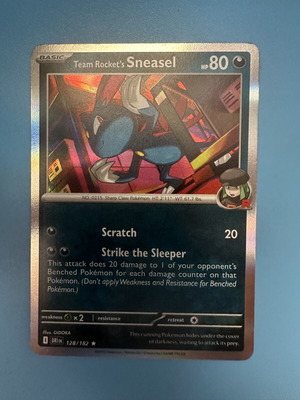 Team Rocket's Sneasel Pokemon Card new