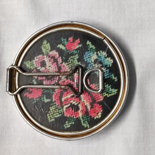 Vintage small portable mirror used with floral design