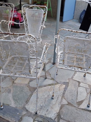Fer Forje set with 4 chairs and glass table used