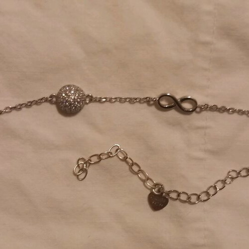 Silver bracelet with stones and infinity symbol like new