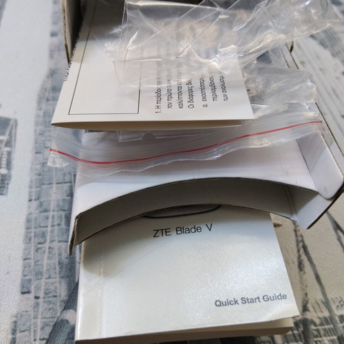 ZTE Blade V packaging like new, empty box with papers and seals