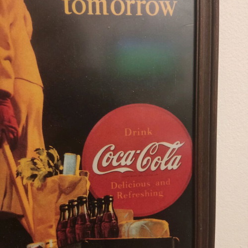Coca Cola advertisement in wooden frame used