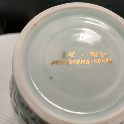 Vintage ceramic vase from North Korea with gold accents