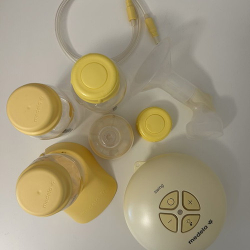 Medela Swing breast pump lightly used, electric and battery