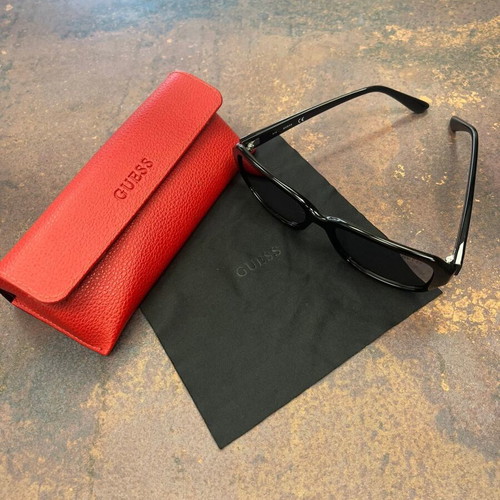 Guess women's sunglasses with red protective case and black cloth