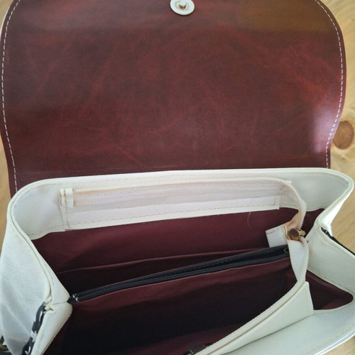 D. Raggi backpack with bow and polka dot details, like new