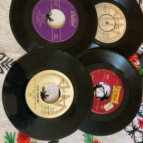 Vinyl 45 rpm records used, pack of 12 with Greek and foreign songs