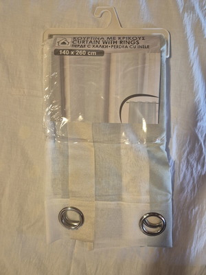 Striped curtain with rings