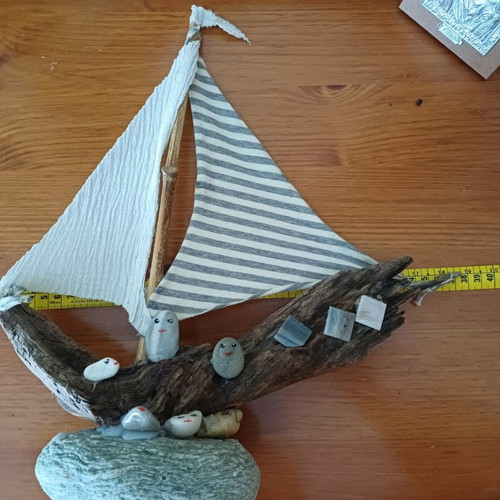 Handmade decorative ship from driftwood and pebbles, new