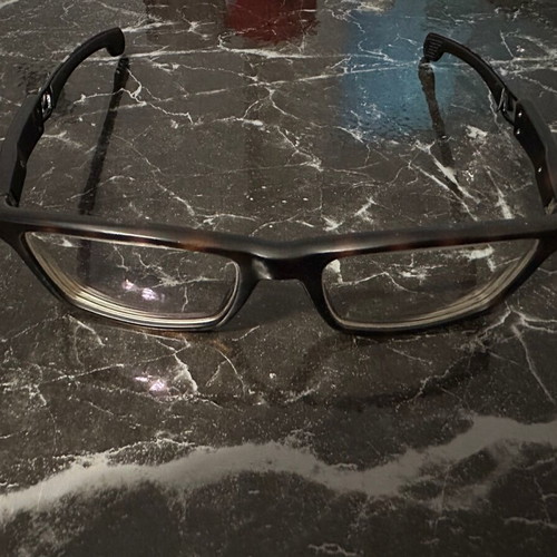 Carrera eyeglass frame used, black with light brown
