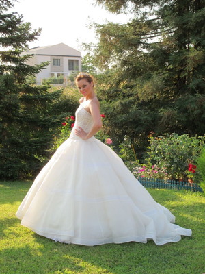 Wedding dress like new, white with gold rhinestones on bust