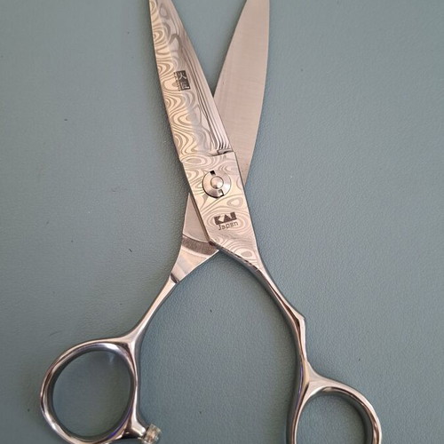 Hairdressing scissors lightly used