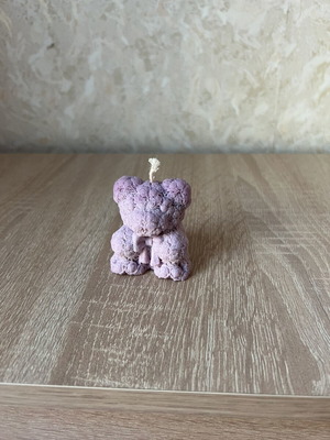 Candle bear new, made of miniature purple roses