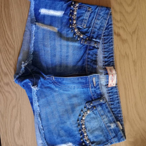 Pink Woman denim shorts short like new, size 38 medium with studs