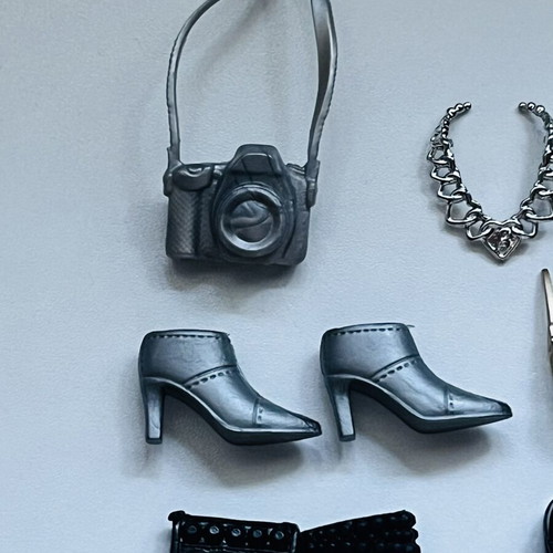 Doll accessories like new, small silver and black set