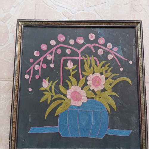Vintage embroidered handmade frame with thread used