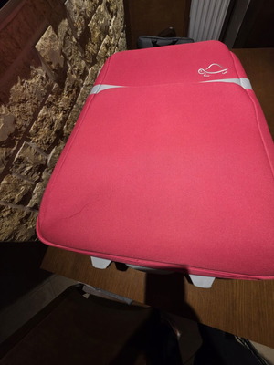 Carpisa 24" travel suitcase used, magenta color, semi-hard fabric
