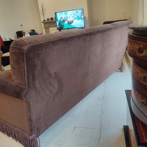 Handmade sofa used with brown velvet upholstery and walnut legs