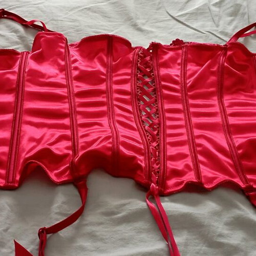Corset red like new, elastic fit medium to large