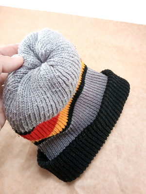 Warm multicolor acrylic hat used